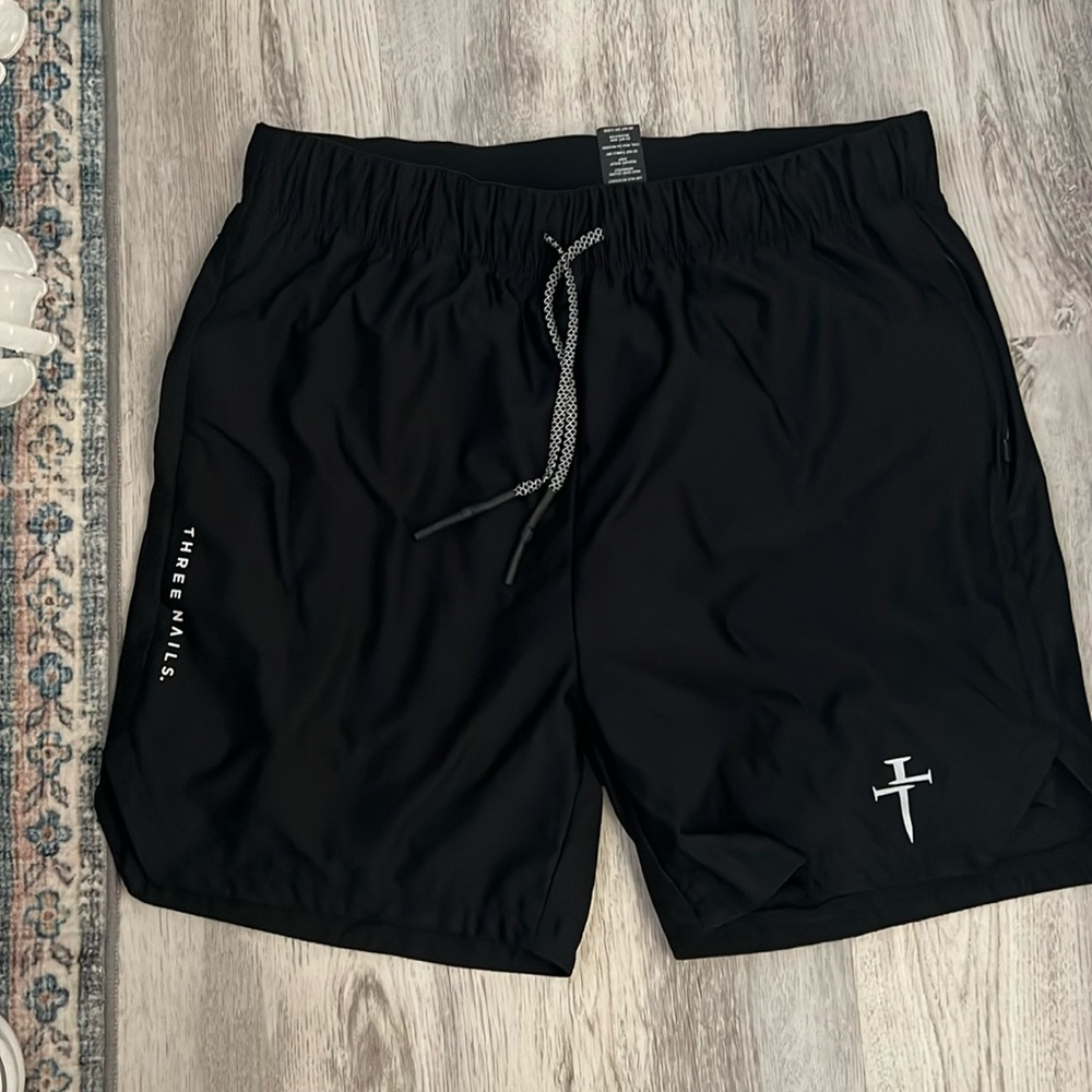 Three nails Men’s workout shorts